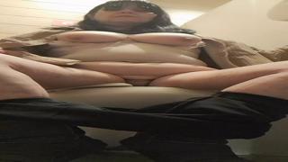 Filthy floozy gets her rocks off in a public loo