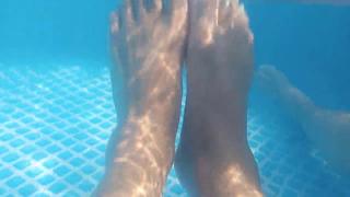 Scrubbing sweaty soles under waves of water