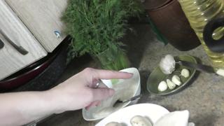 Blonde wife shows off natural tits and legs while cooking naked at home
