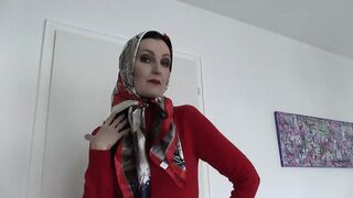 Victoria's sassy satin scarves matched red-hot cashmere, revealing a ravishing sweater