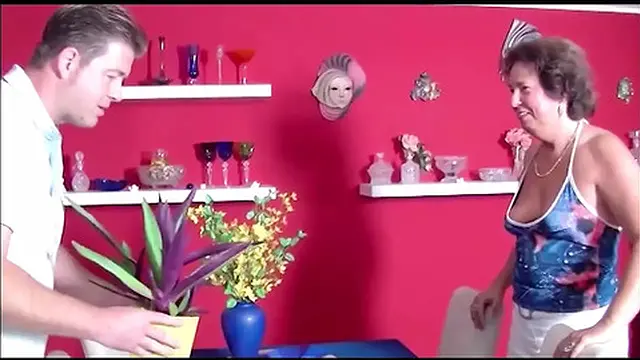 Matronly breasts on the table for rough fuck