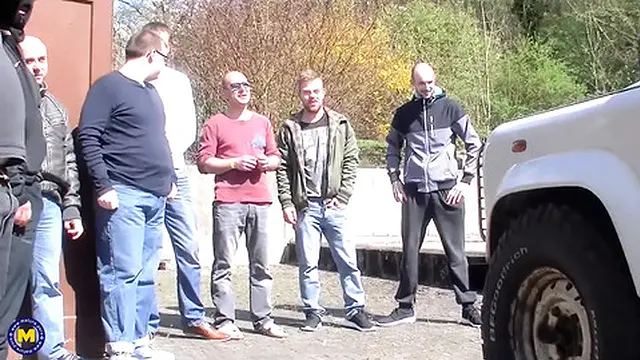 German milf enjoys a wild group sex session