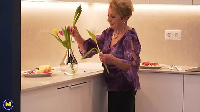 Strong man pleases elderly woman