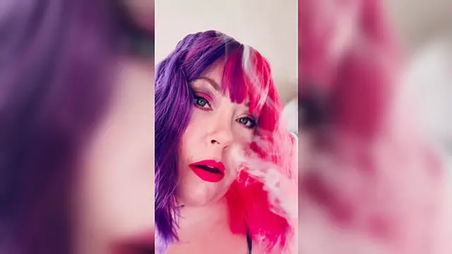 Chubby Cougar Tina Snua Lights a Cork Tipped Cigarette in Latex Gloves