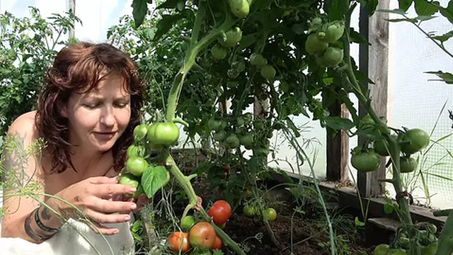 Rural MILF Pleases Herself &mdash;  Making the Tomatoes Sweat